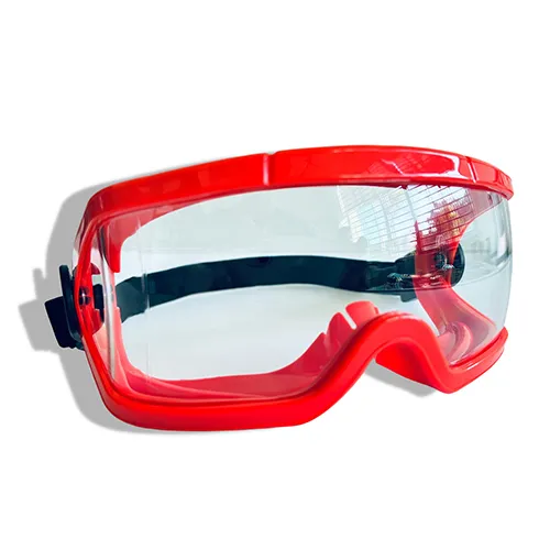 A finished pair of red-framed protective goggles with a high-transparency PC lens, showcasing full-cycle manufacturing from mold development to final assembly.