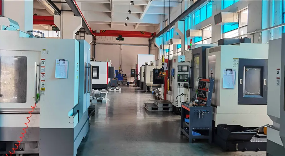 Optical lens injection molding workshop with CNC machining centers in a clean, organized production environment